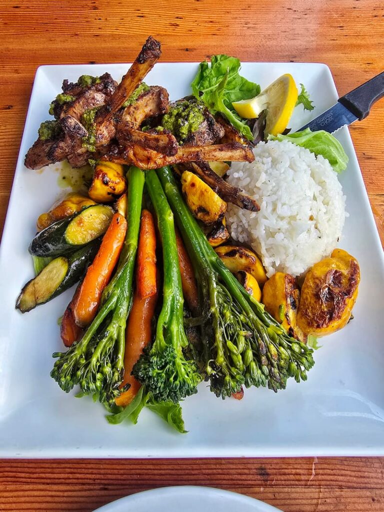 lamb pops, rice, and vegetables