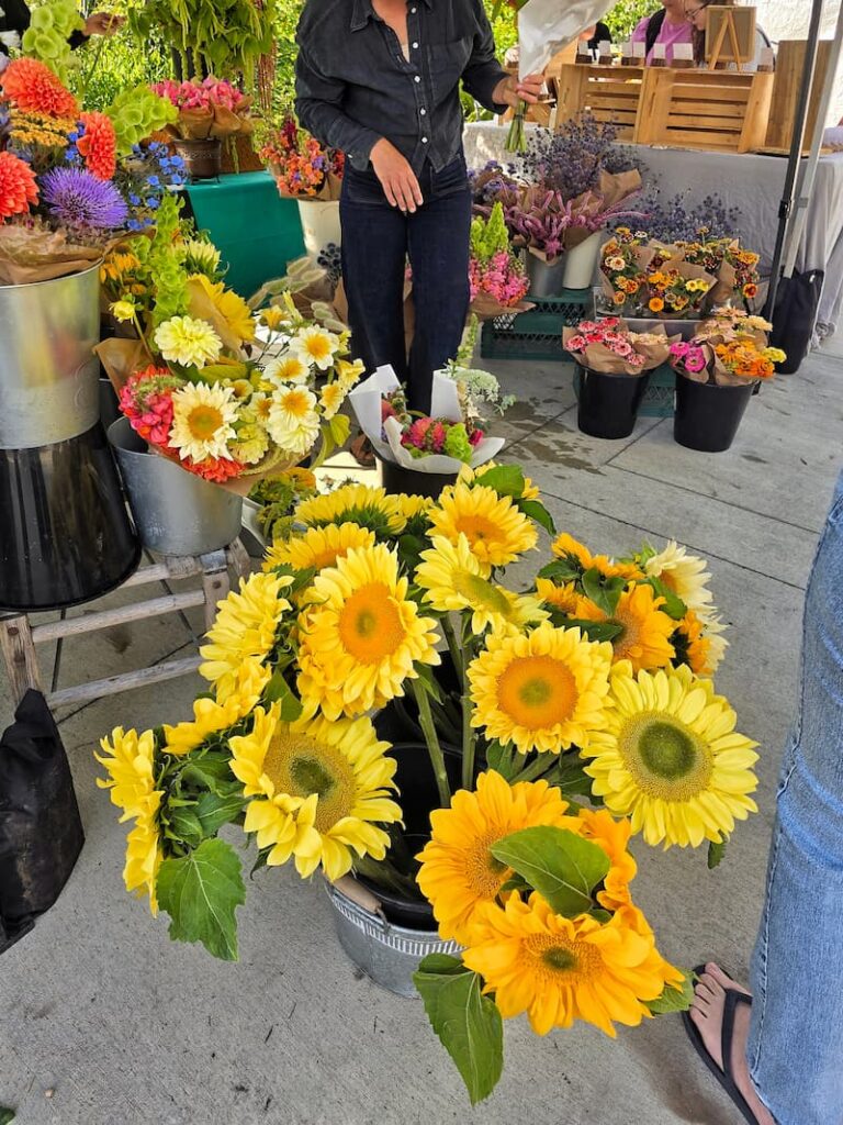 Summer Love flowers booth at the farmers market