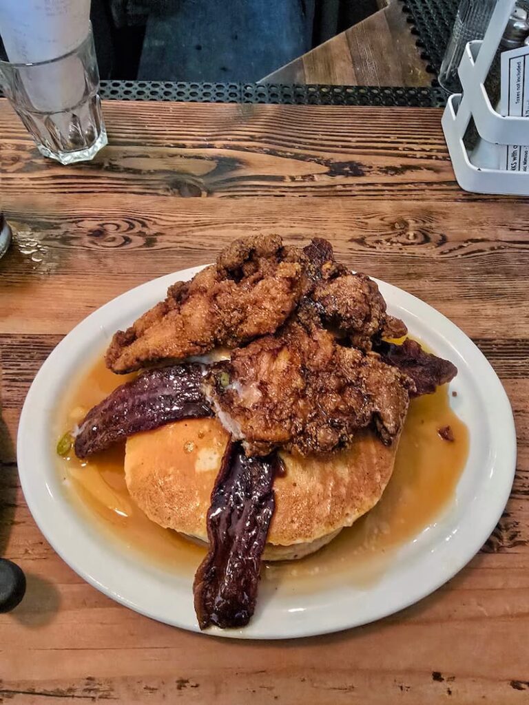 Chicken and pancakes with bacon breakfast at Jam Cafe in Victoria BC
