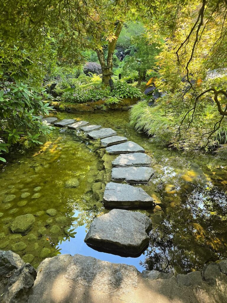 stone pathway in the water at the Japanese Gardens in Butchart
