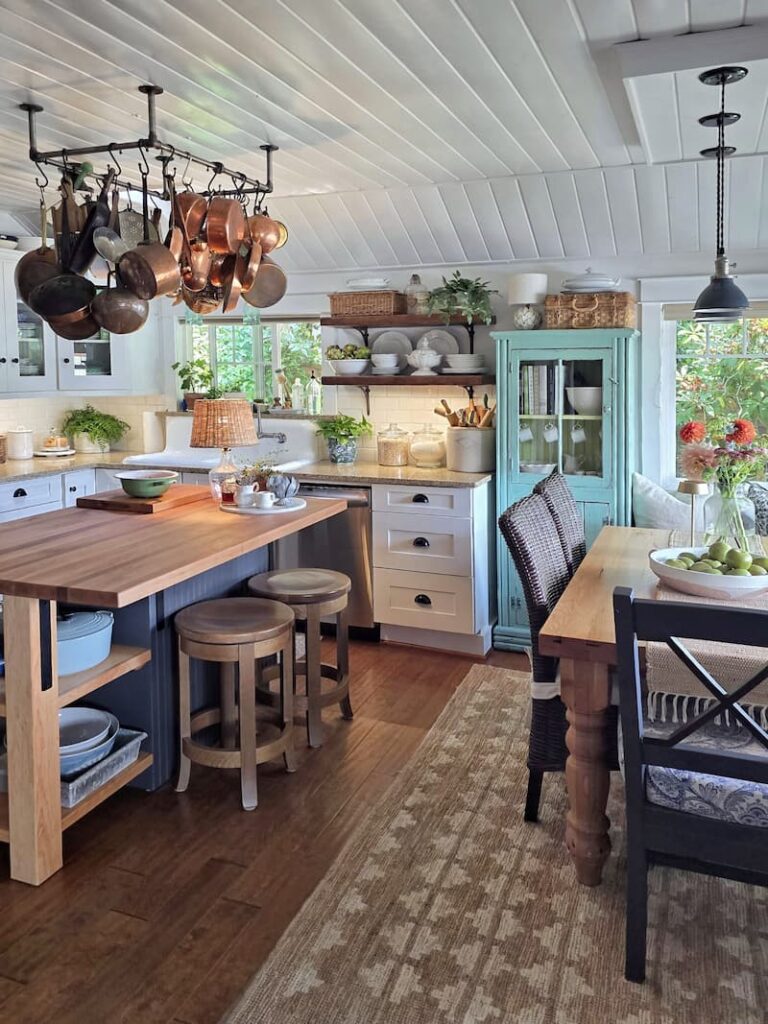Everyday cottage kitchen in August with summer light and vintage decor