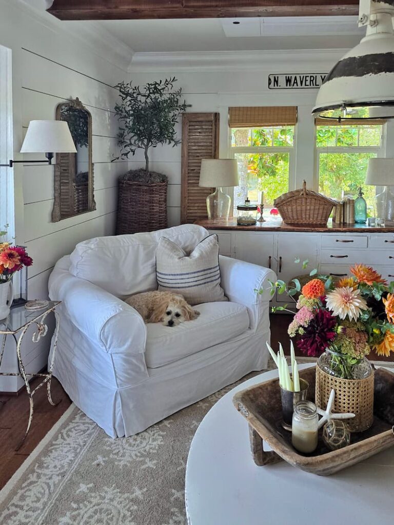 white slipcovered chair in the cottage living room