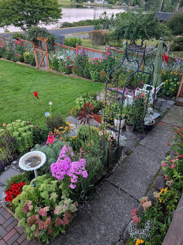 evening view from the deck of a cottage garden