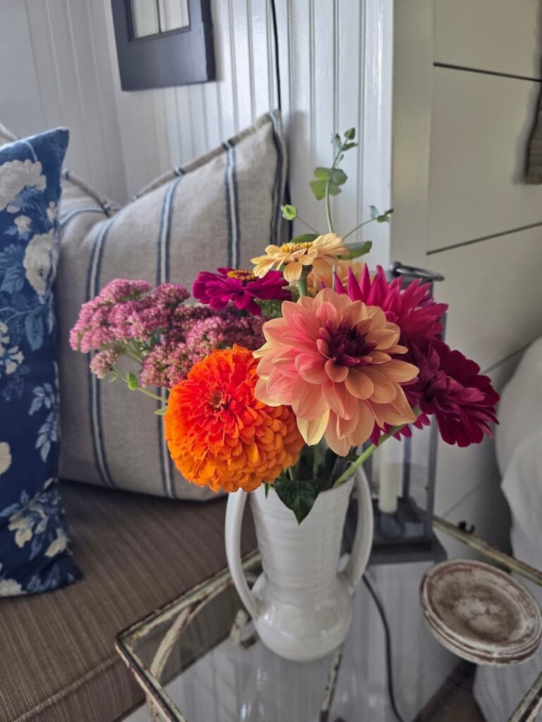 Summer flower arrangements from the garden displayed inside a cottage on Puget Sound