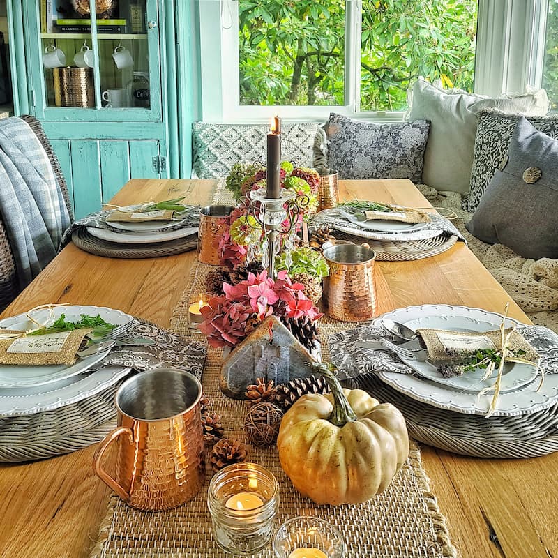 fall flowers and pinecones for centerpiece on table