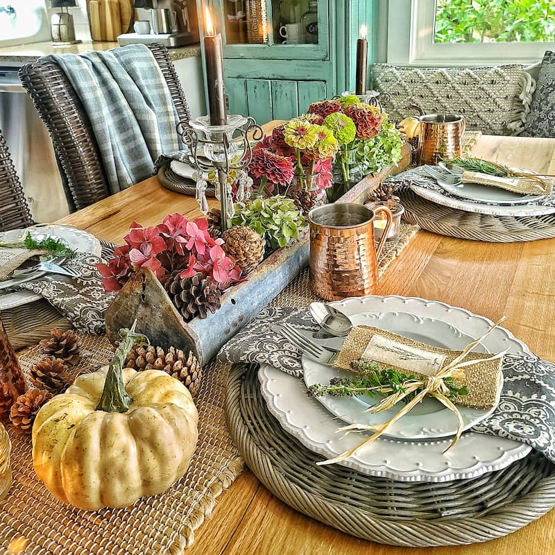 Fall tablescape with herbs, hydrangeas, and zinnias
