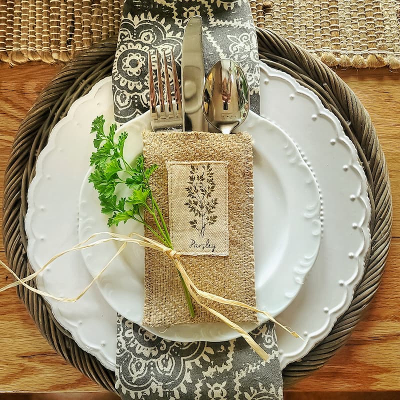 fresh parsley and silverware pouches with herbs