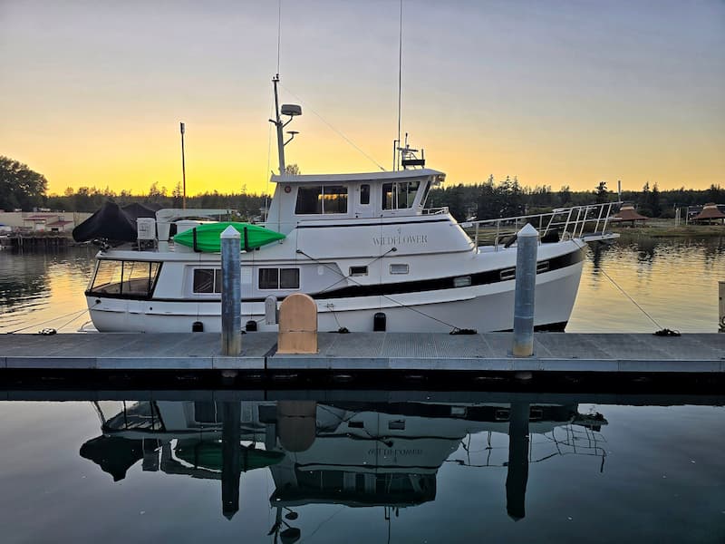 Our Kadey Krogen Whaleback trawler Wildflower tied up at the La Conner town dock at sunset