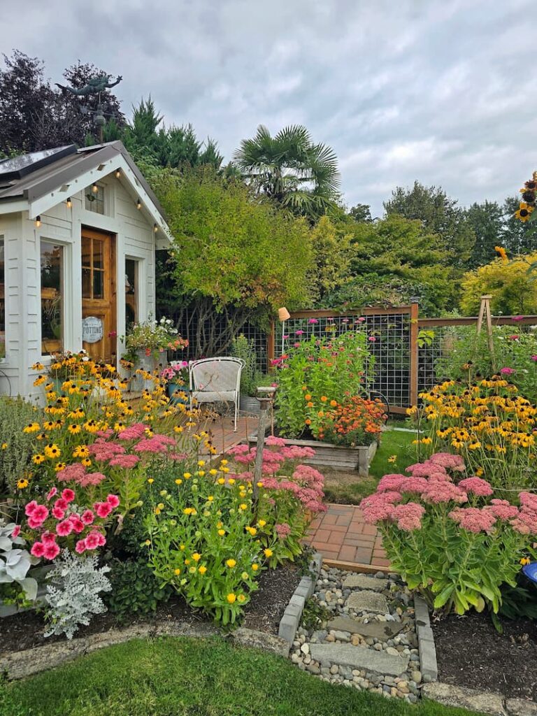 PNW cottage garden and greenhouse in September