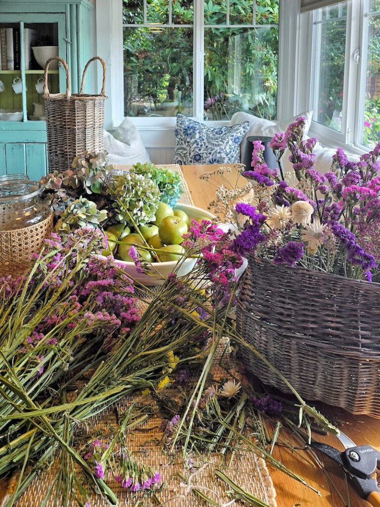 Dried flowers from the garden on the table in a Pacific Northwest beach cottage